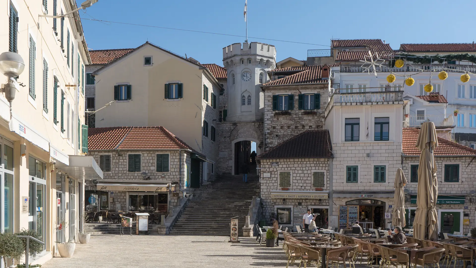 Nikola Đurković Square in Herceg Novi Old Town, with stone buildings and cafés
