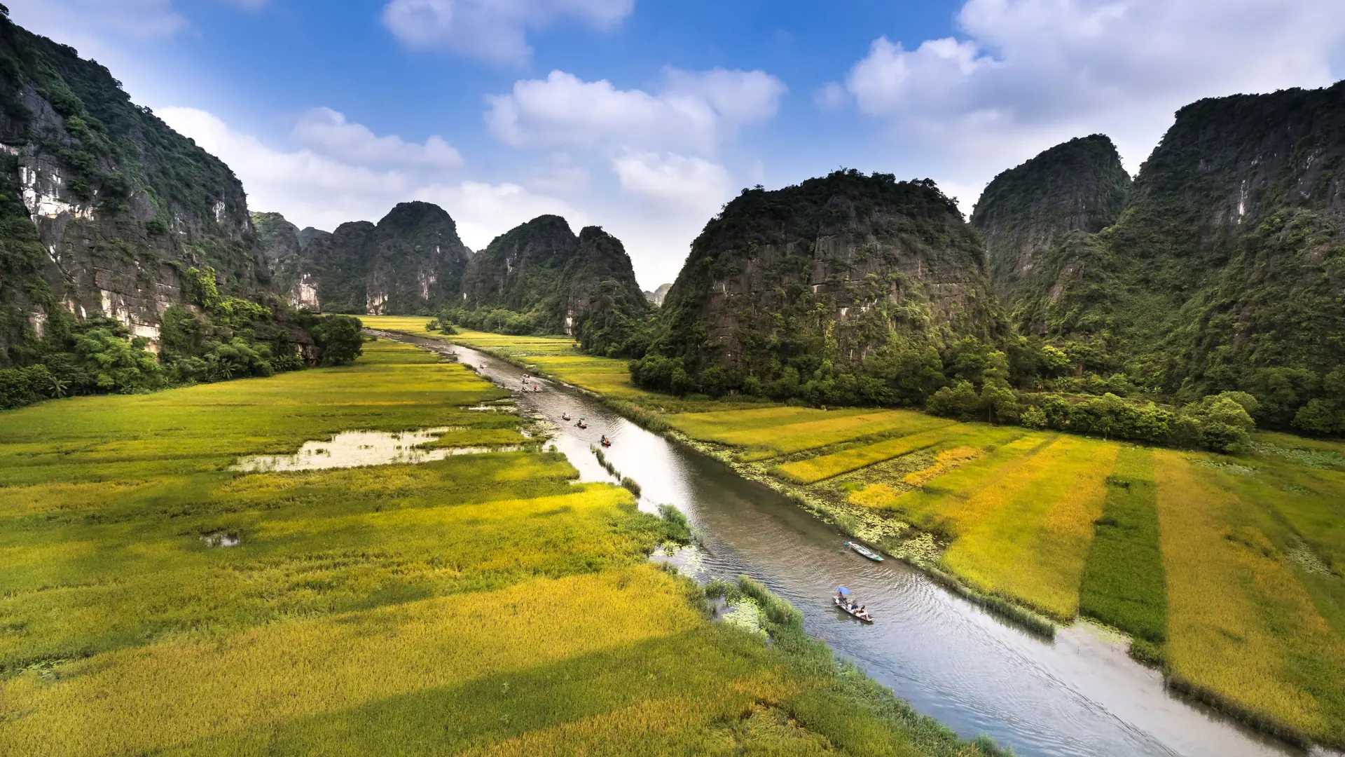 Tam Coc rice fields beside the Ngo Dong waterway