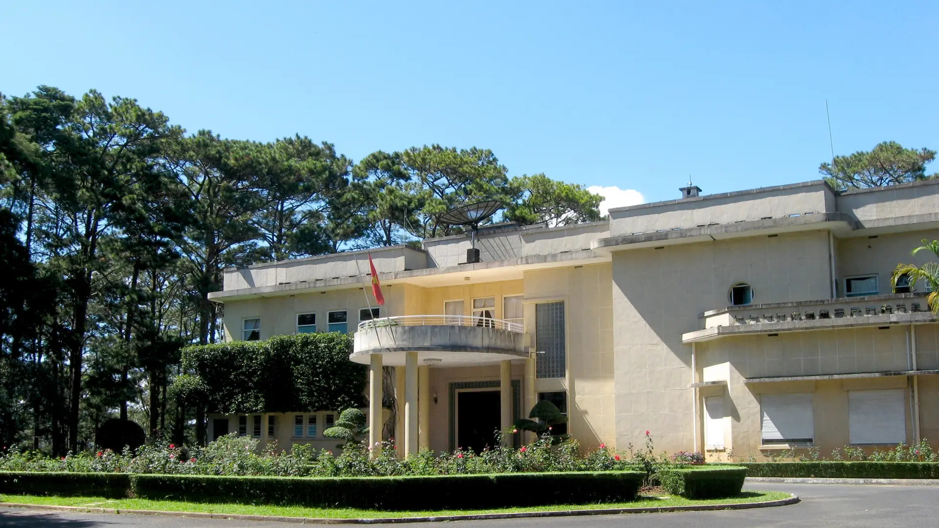 Yellow Palace II building and its pine-lined garden in Da Lat