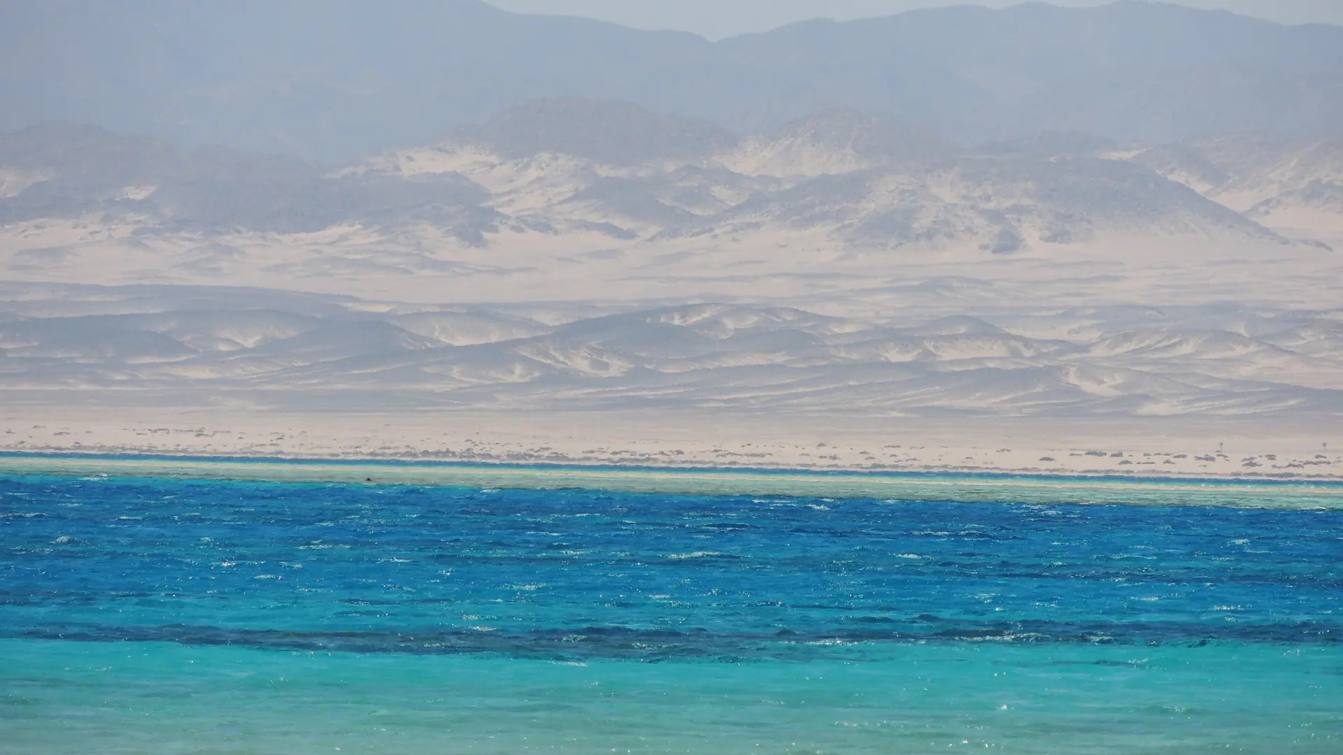 Turquoise water at Ras Hankorab beach in Wadi el-Gemal, south of Marsa Alam
