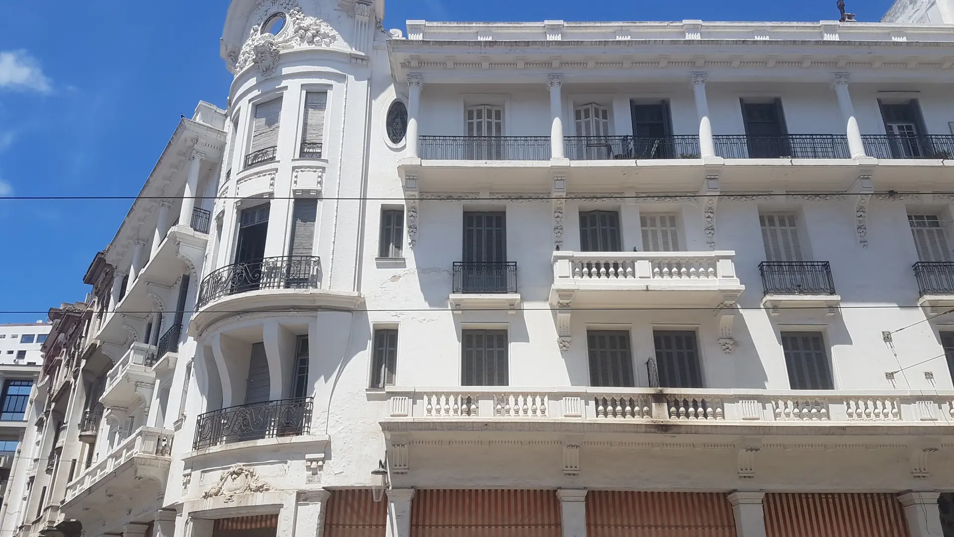Sunlit Art Deco façades on a central Casablanca boulevard