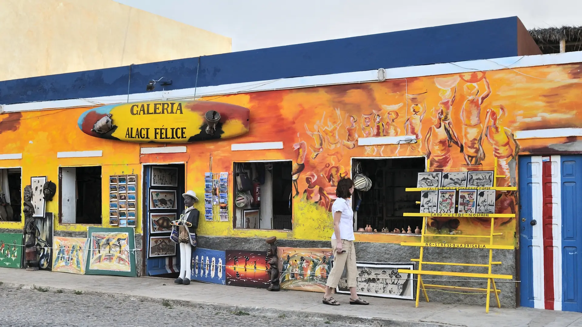 Colourful art shop on a sunlit street in Santa Maria, Sal