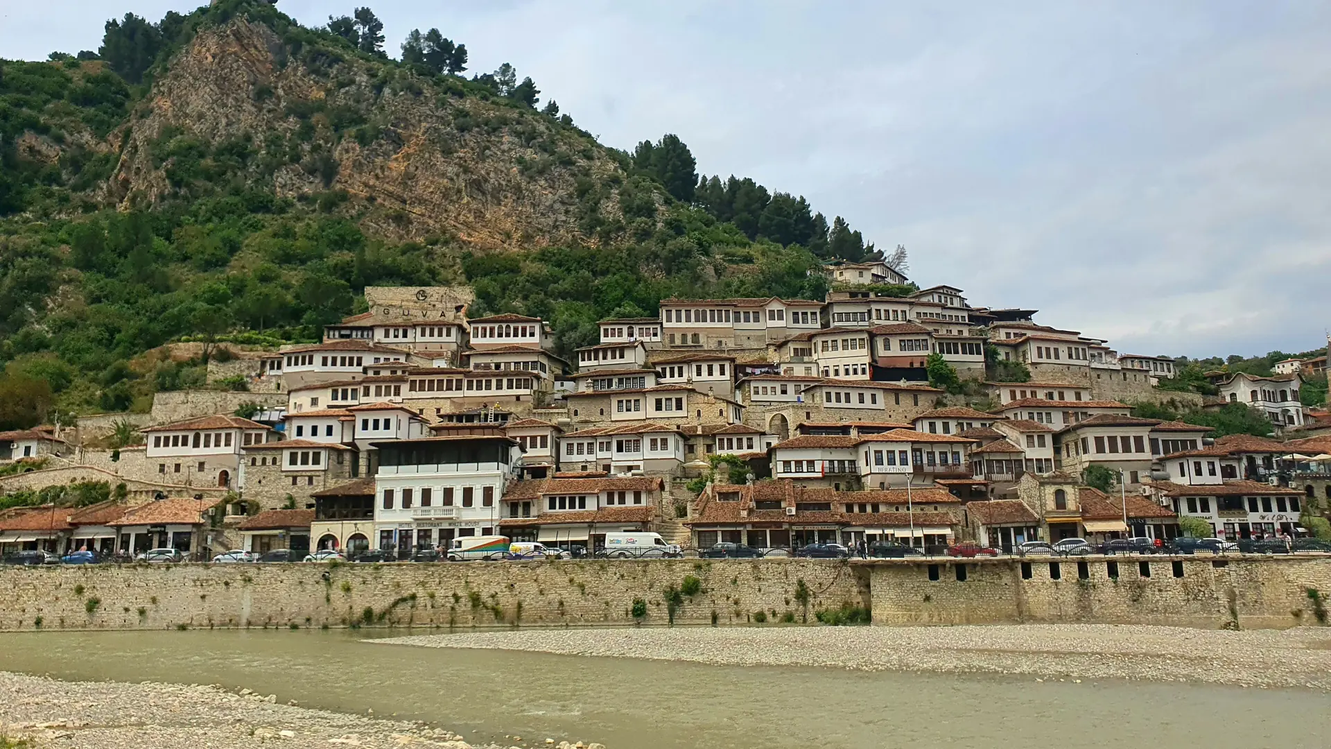 Tiers of windows on the Ottoman houses of Mangalem, Berat, seen from across the river