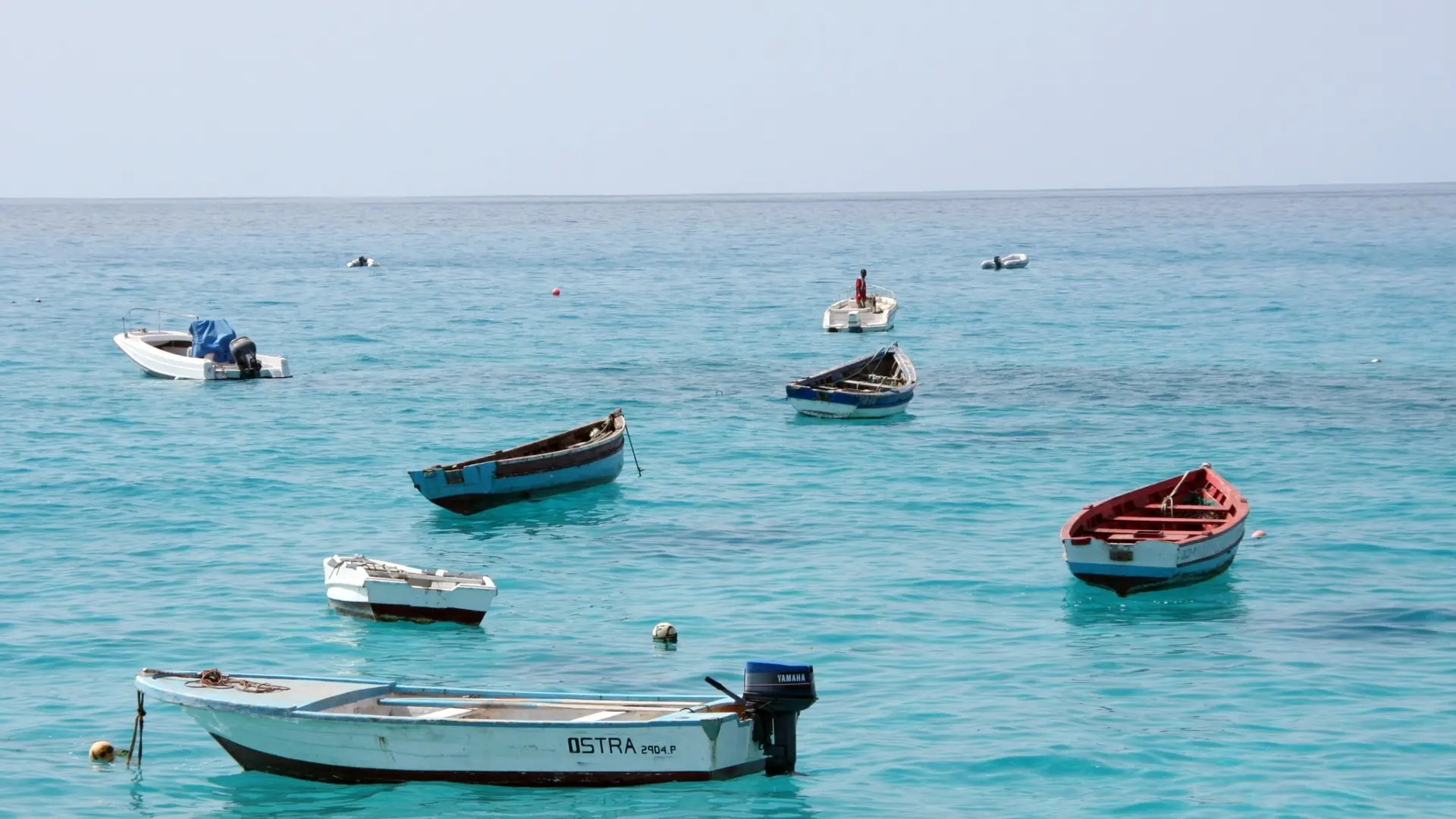 Fishing boats on turquoise water at Santa Maria, Sal