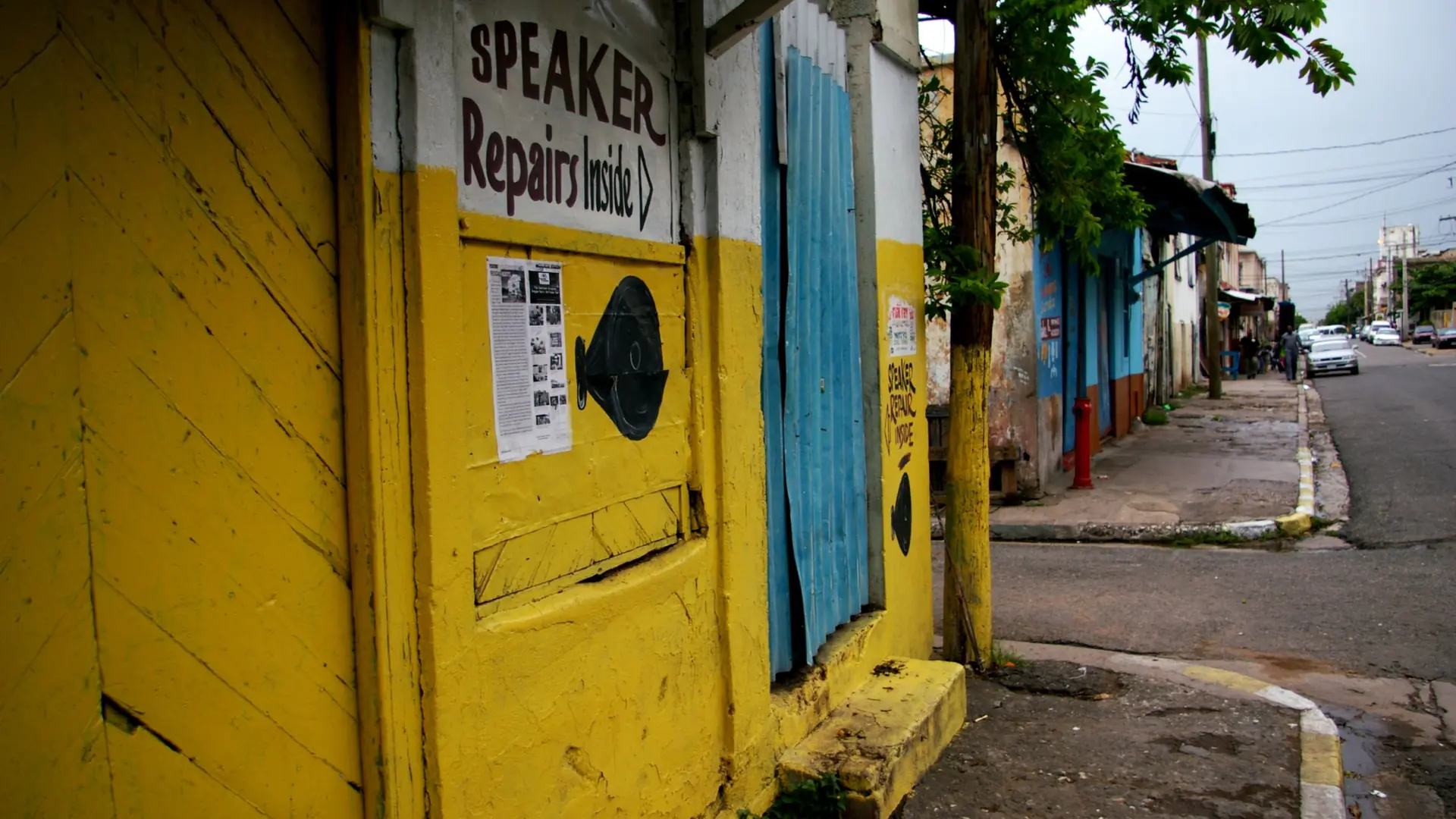 A painted storefront on a Kingston street associated with sound-system history