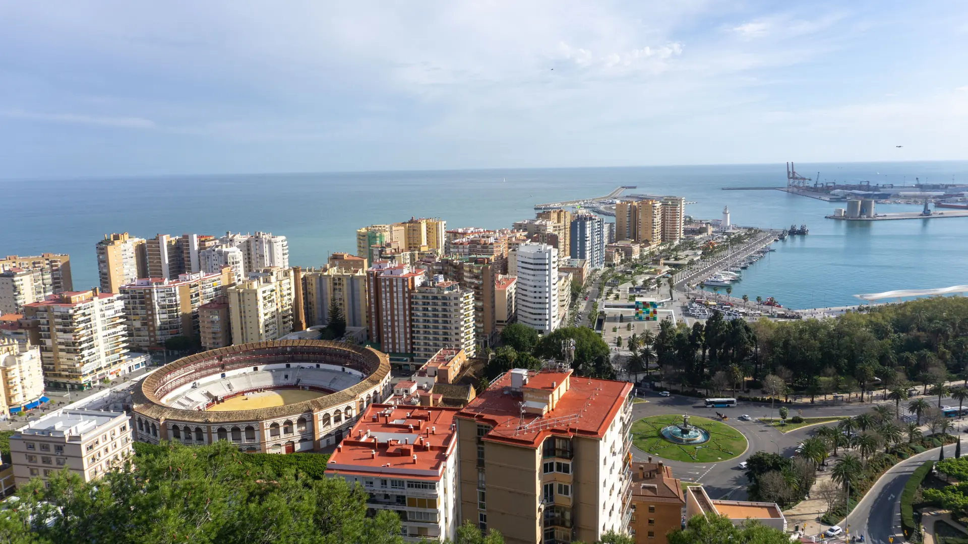 La Malagueta bullring, Málaga city buildings and the Mediterranean coast in daylight