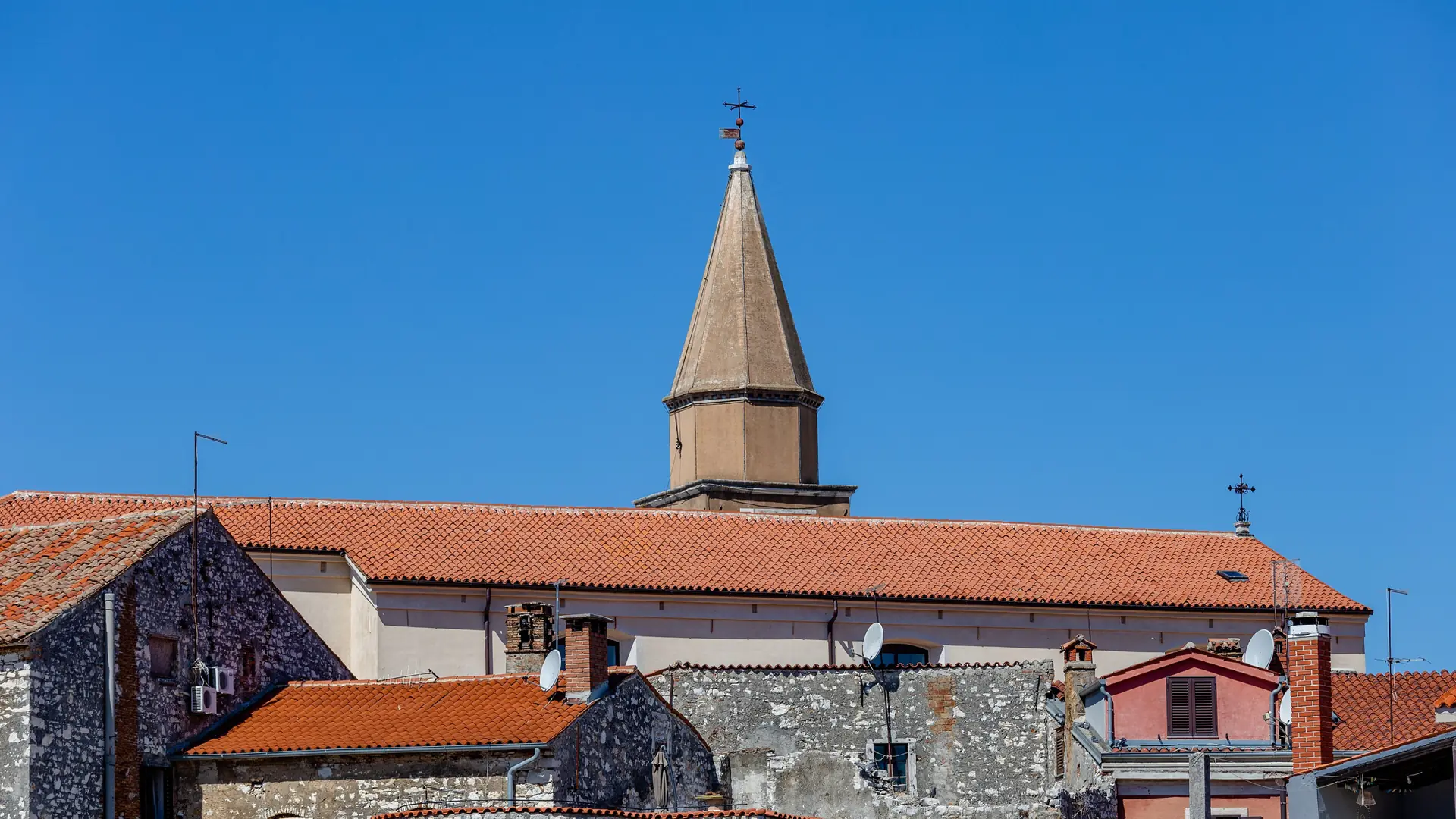 Old Town roofs below the Church of the Assumption tower in Umag