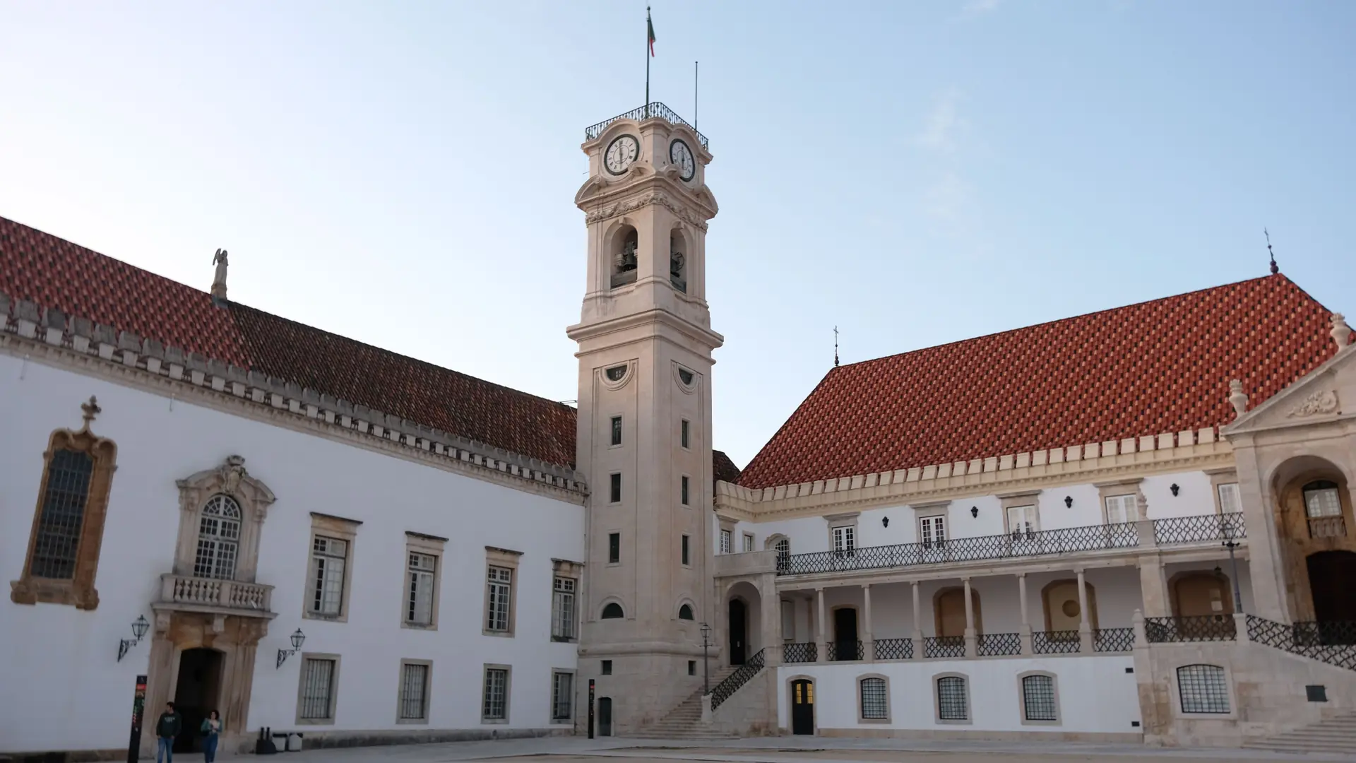 University of Coimbra clock tower above the white buildings of the upper city