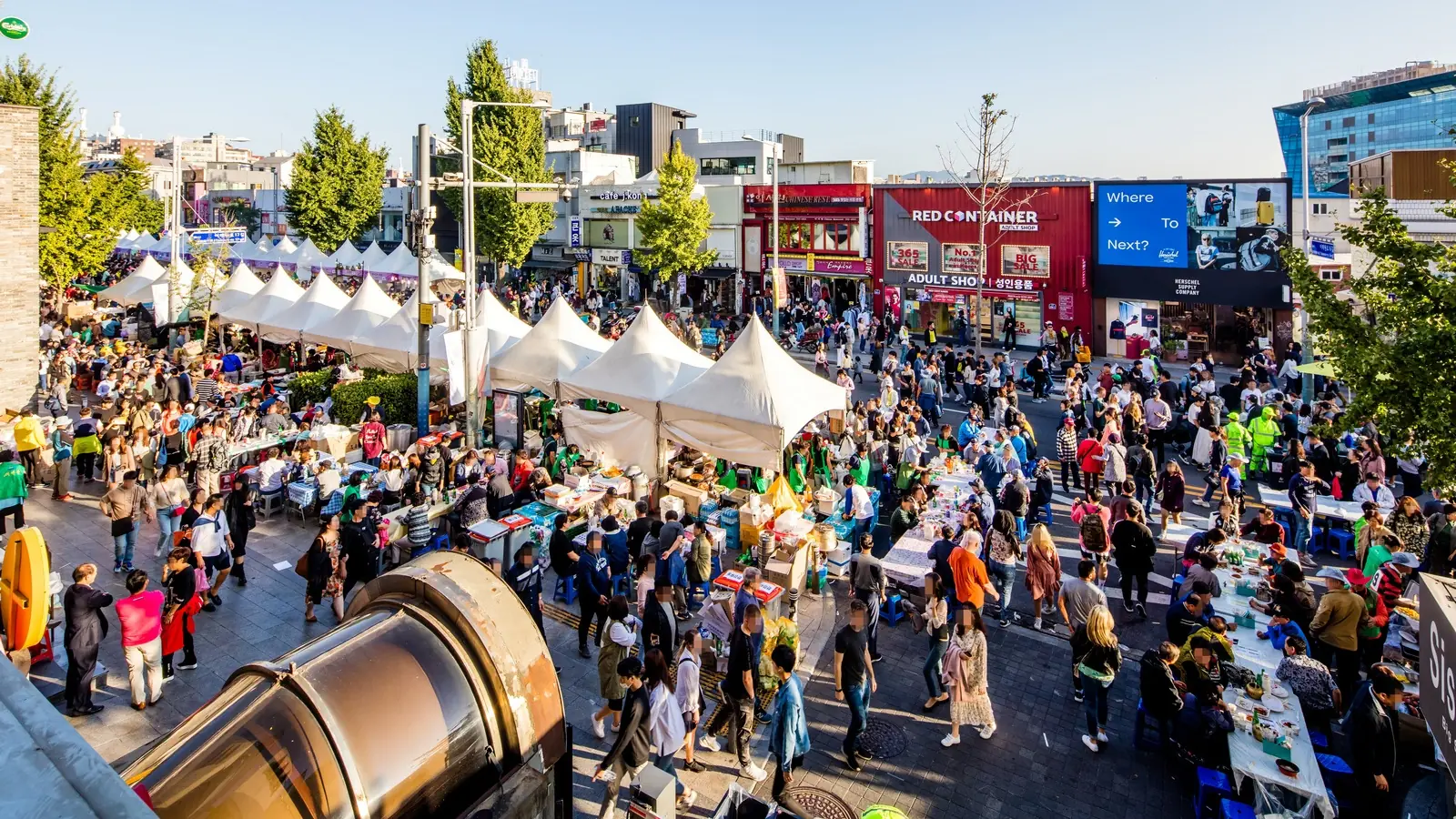 Daytime stalls and crowds on Itaewon-ro during the 2019 Itaewon Global Village Festival in Seoul