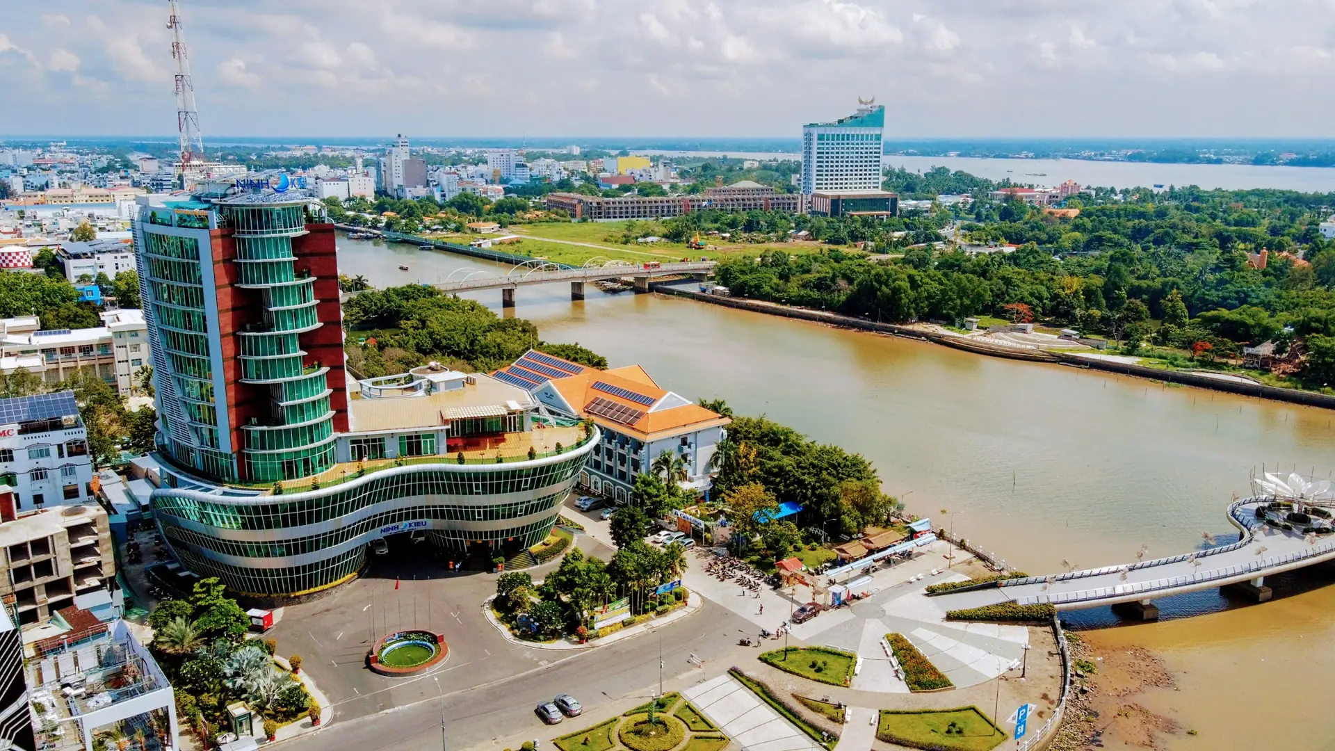 Can Tho waterfront and the Ninh Kieu hotel beside the river in bright daylight