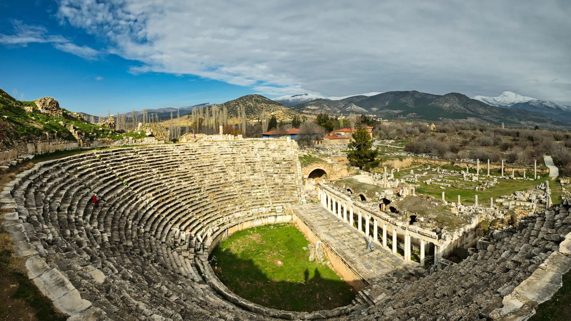 Aphrodisias theatre and its curved tiers of ancient stone seats