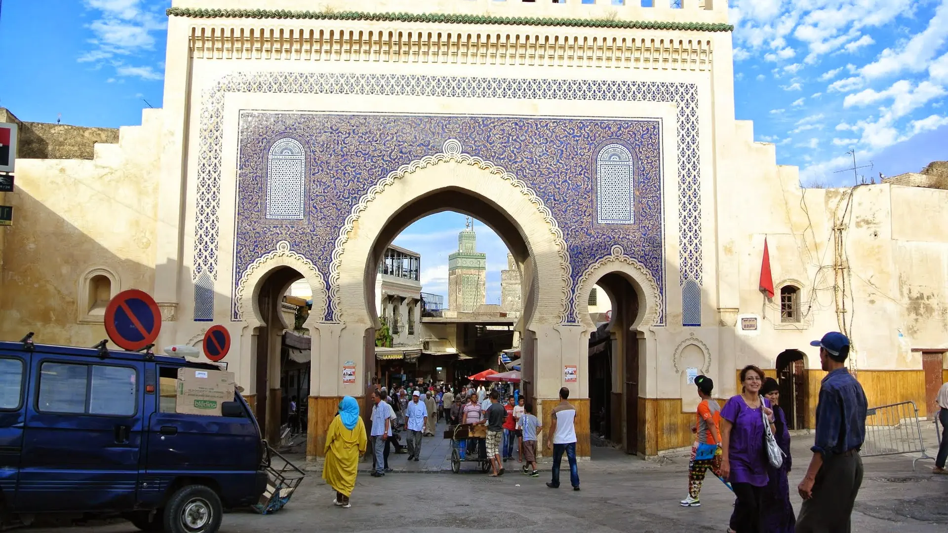 Bab Boujloud gate opening into sunlit Fez medina