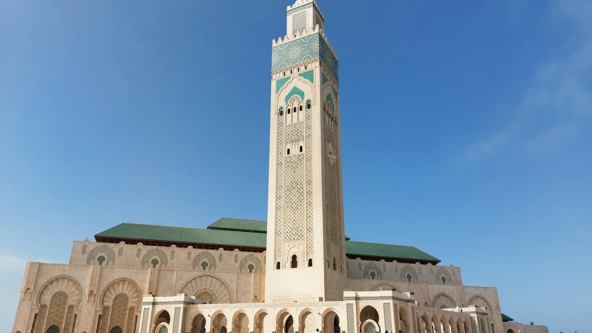 Hassan II Mosque and minaret beneath a clear Casablanca sky