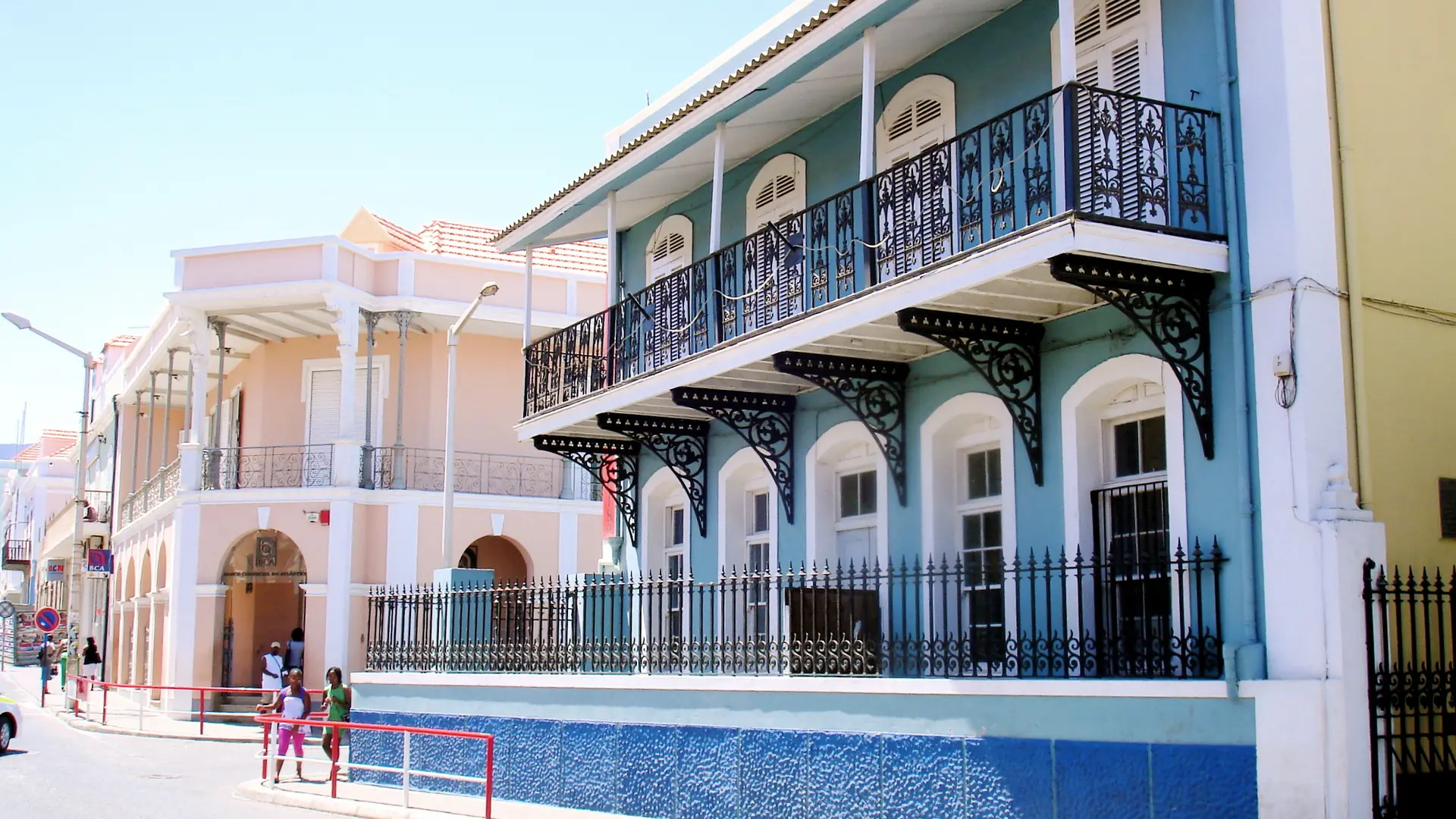 Pastel colonial facades along a bright street in Mindelo, São Vicente