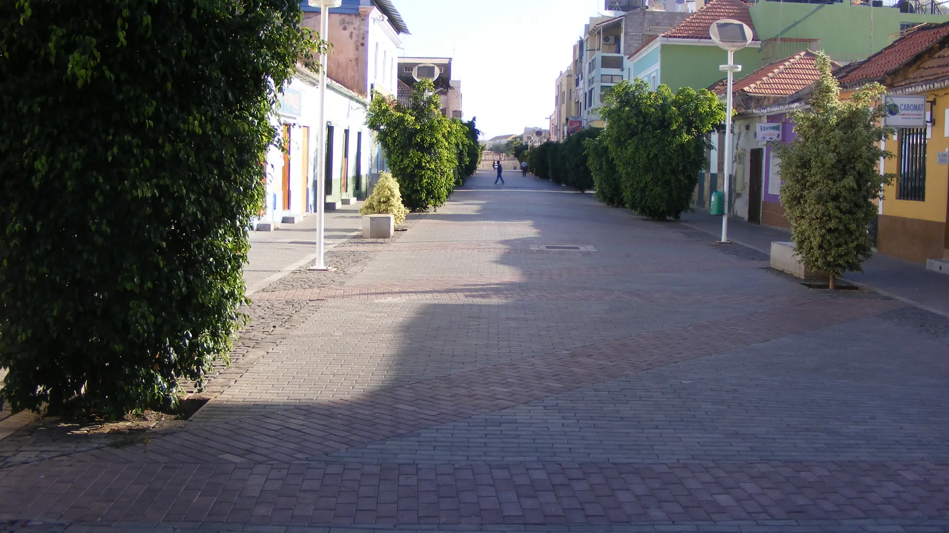 Tree-lined pedestrian street through Praia’s Plateau district