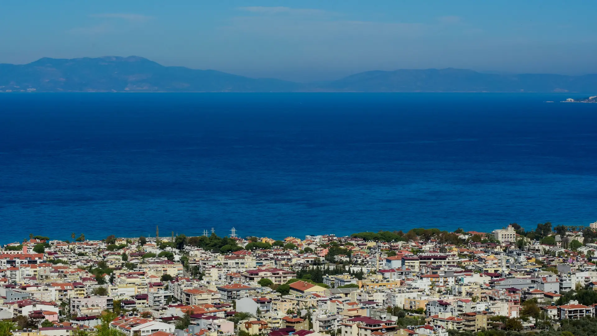 Güzelçamlı coast and forested Dilek Peninsula meeting the clear Aegean Sea