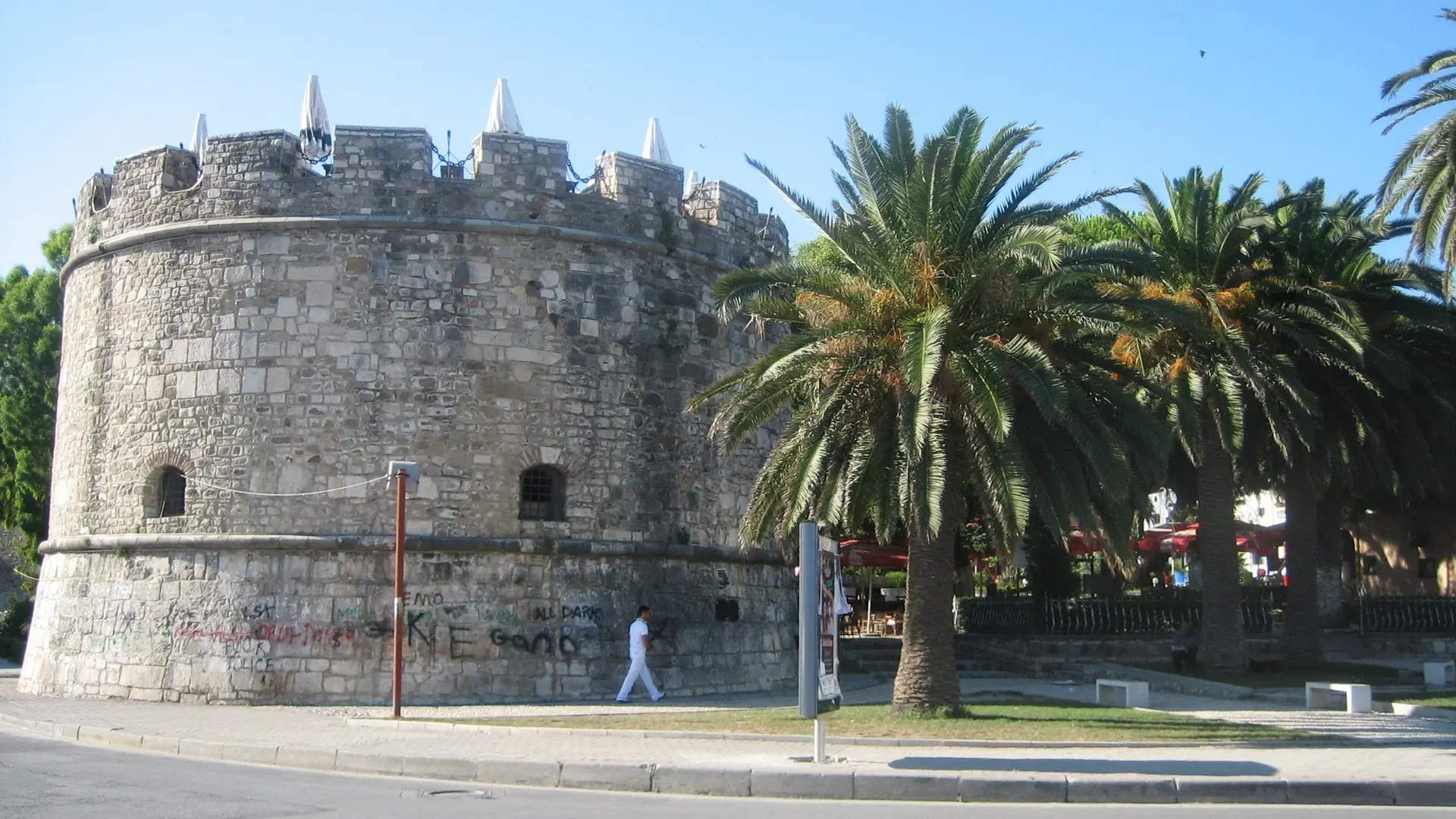 The round Venetian Tower of Durrës standing against a blue sky at the edge of the old town