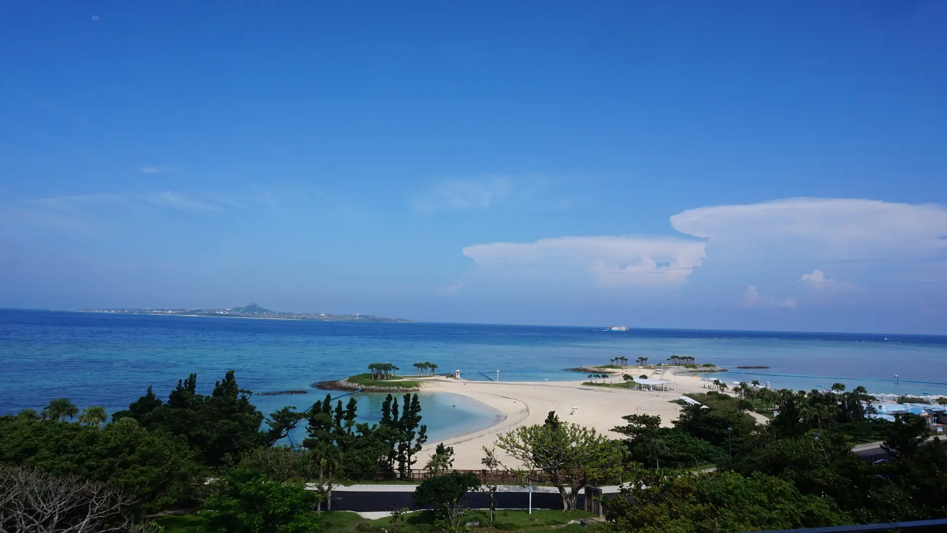 Emerald Beach at Ocean Expo Park in Motobu, with Ie Island beyond the blue sea