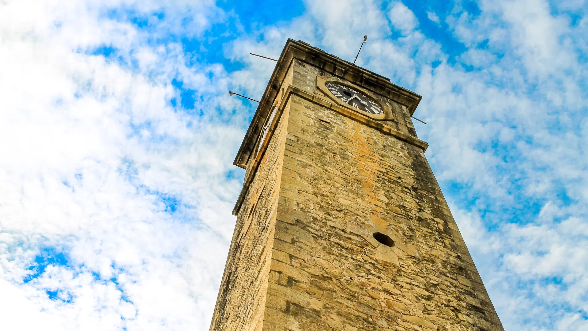 Galle Fort Clock Tower rising into a blue sky