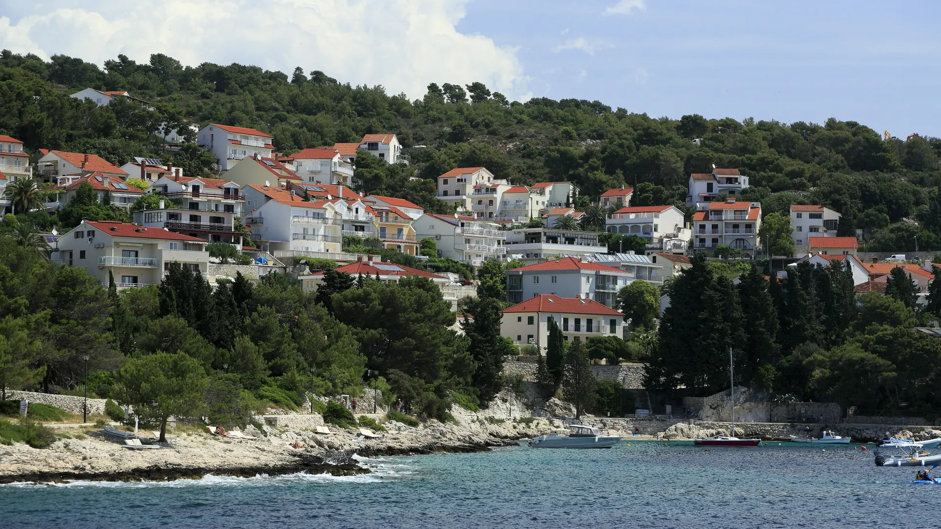 Houses on the rocky shore of Majerovica bay, west of Hvar Town