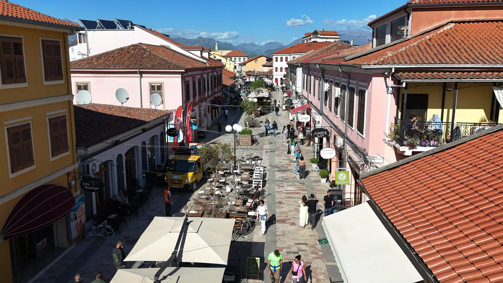 The colourful restored facades of Kolë Idromeno pedestrian street in central Shkodër on a sunny day
