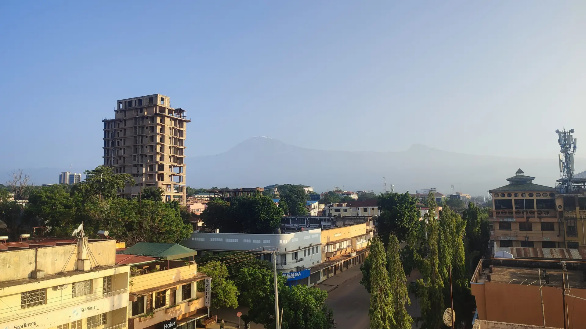 Sunlit Moshi rooftops, streets and trees in Tanzania