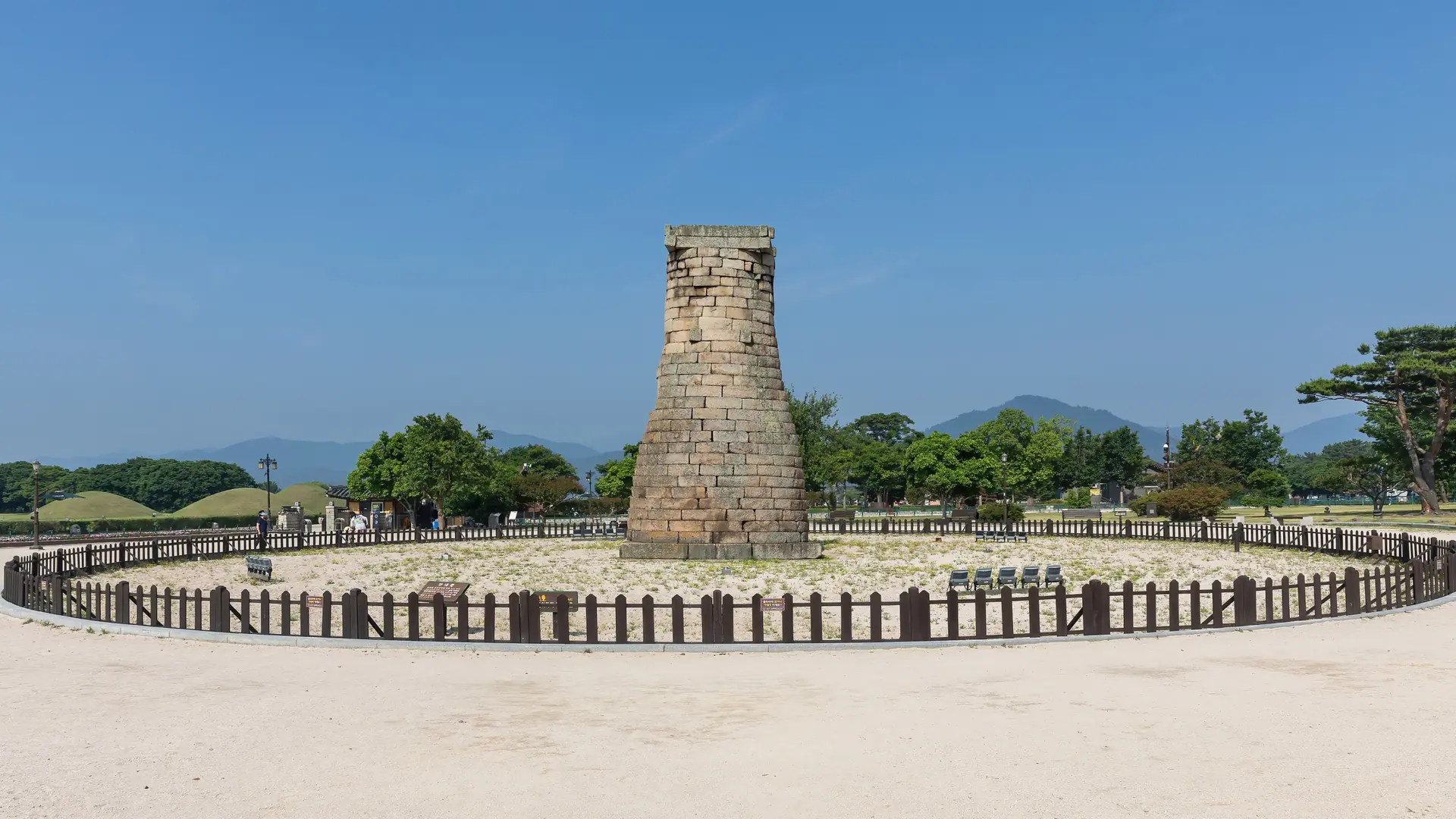 Cheomseongdae, Gyeongju's ancient bottle-shaped stone observatory, under a bright blue sky