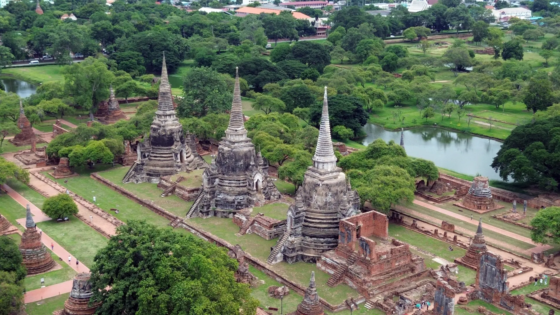 Daylight aerial view of the chedis and green grounds at Wat Phra Si Sanphet in Ayutthaya
