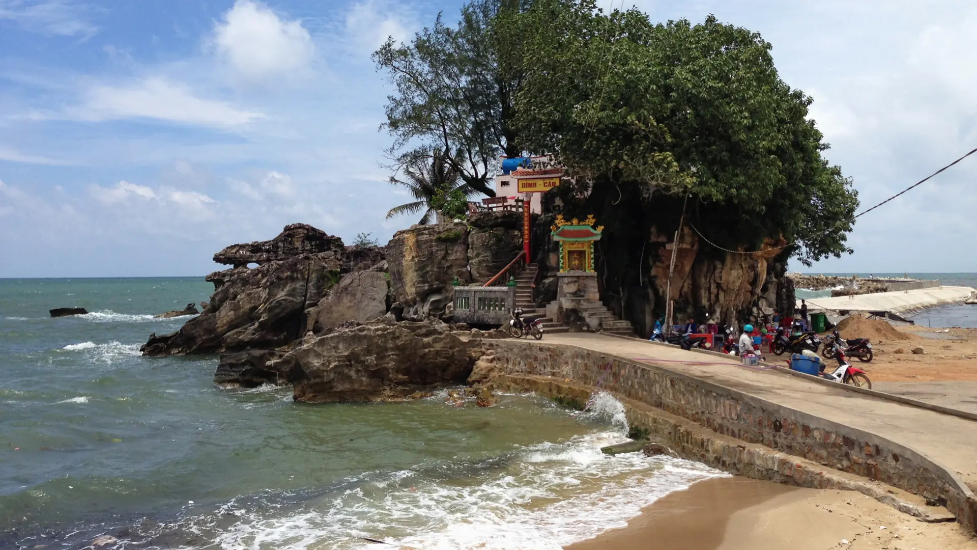 Dinh Cau shrine on its coastal rock beside the Duong Dong harbour entrance