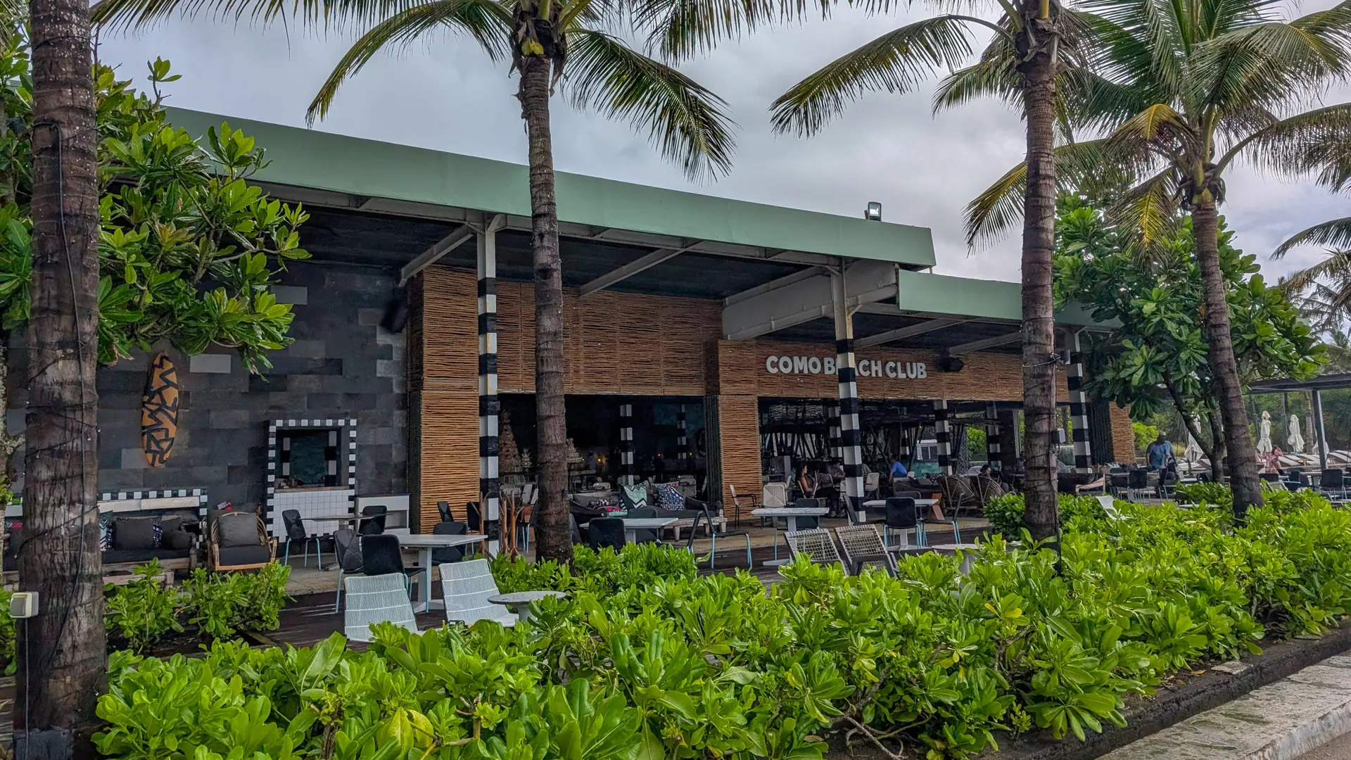 Palms and the low restaurant building at COMO Beach Club beside Echo Beach