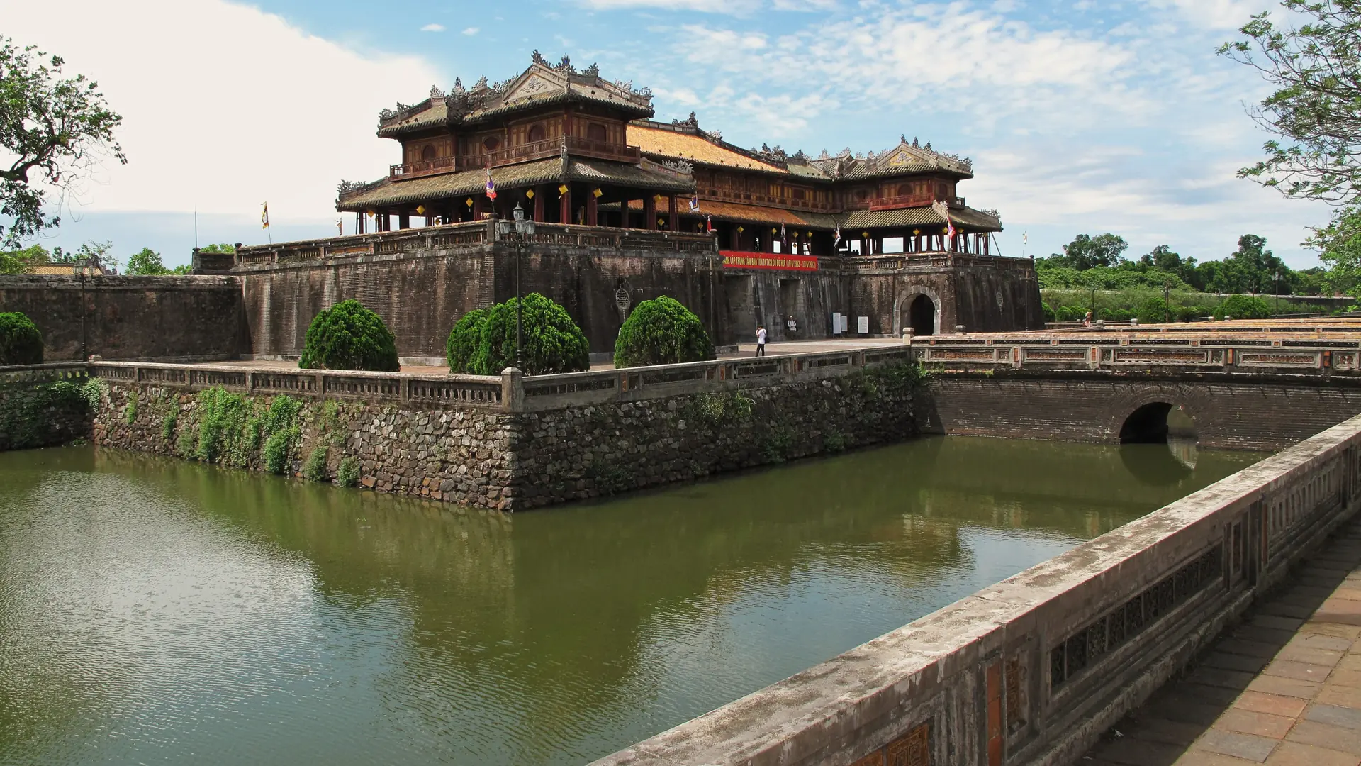 Ngo Mon Gate and its moat at Hue Imperial City in bright daylight