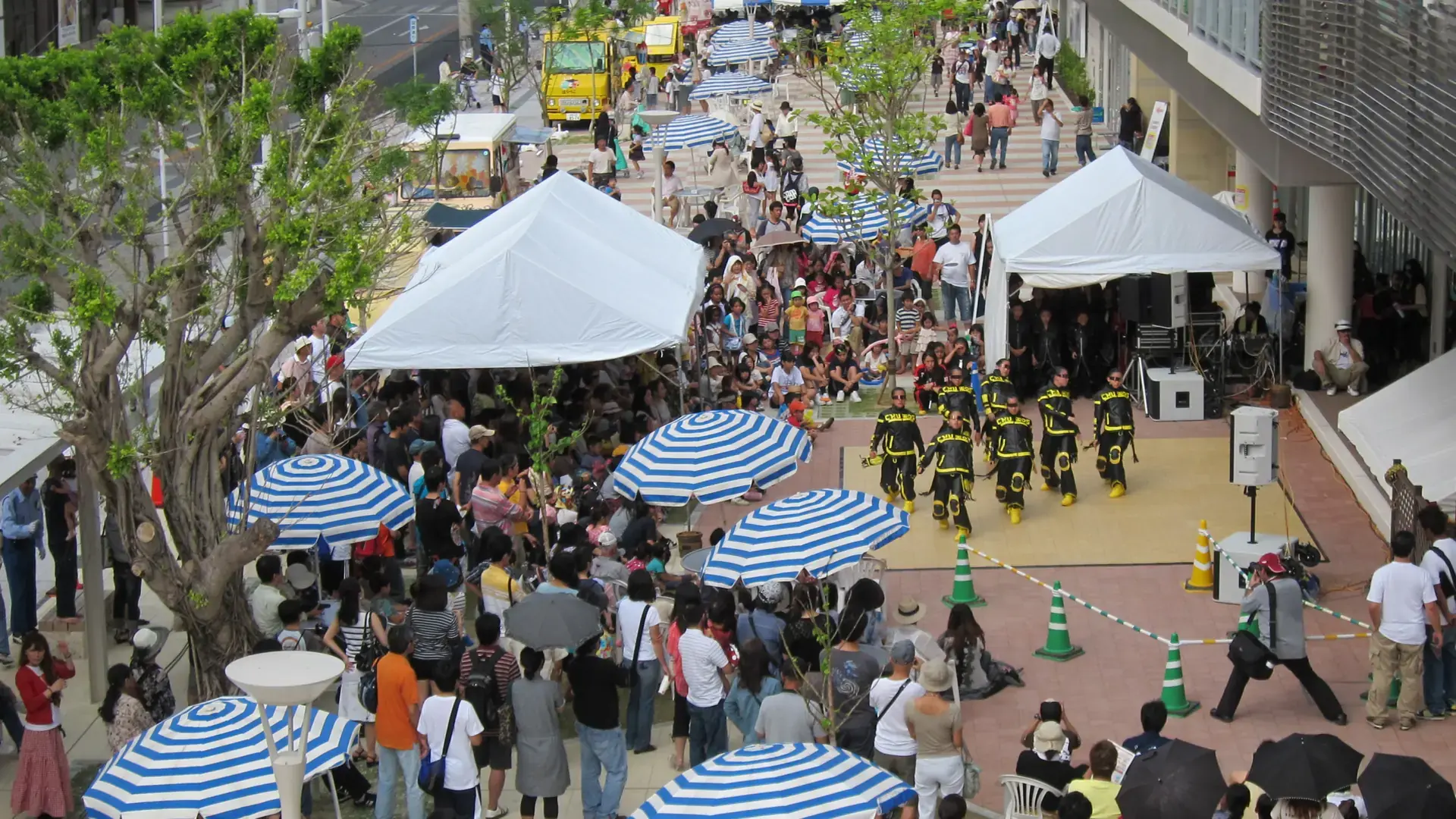 Kokusai-dori's bright palm-lined avenue and colourful Okinawan storefronts