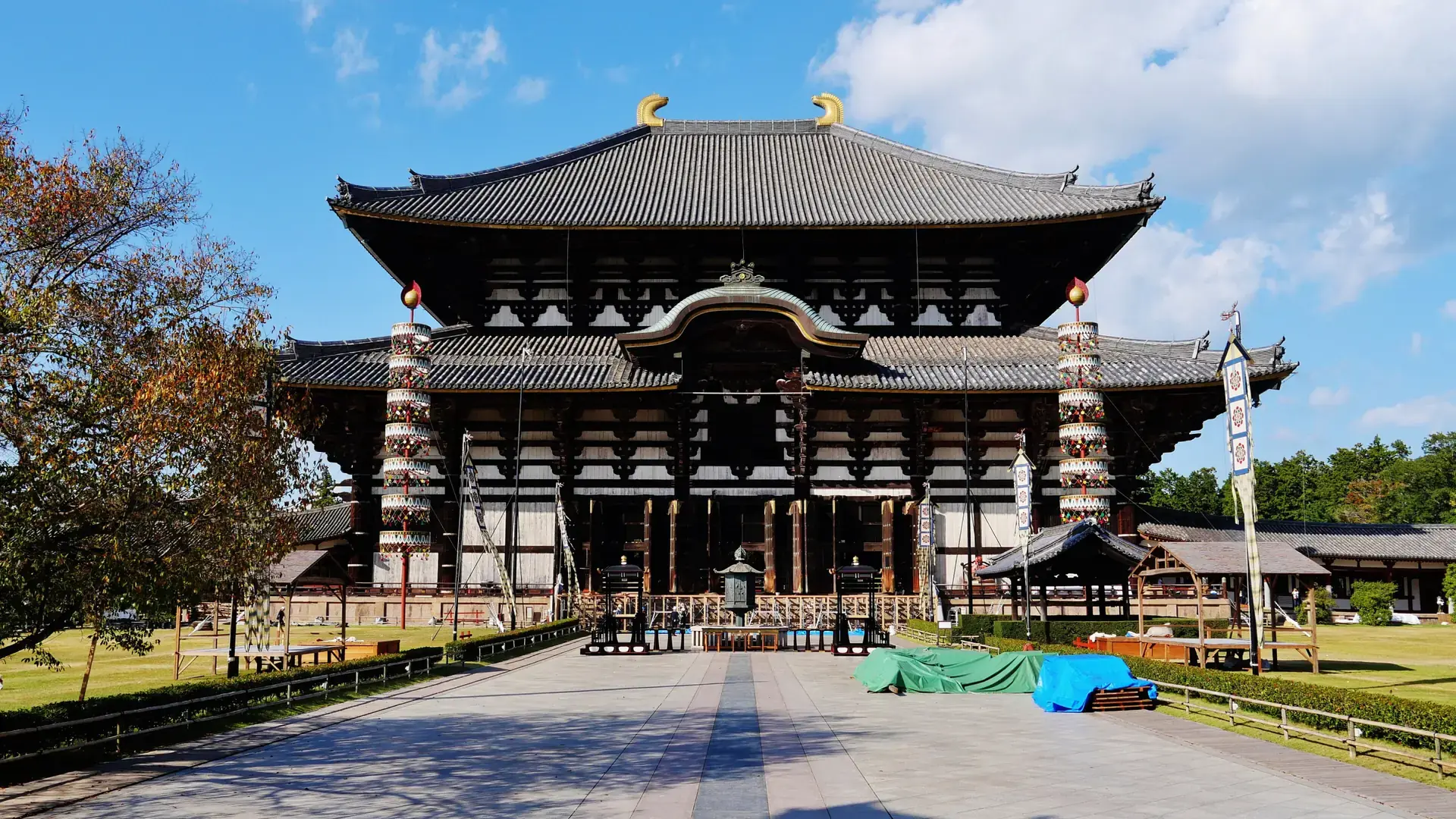 Todaiji's Great Buddha Hall rising above its broad approach beneath a vivid blue sky