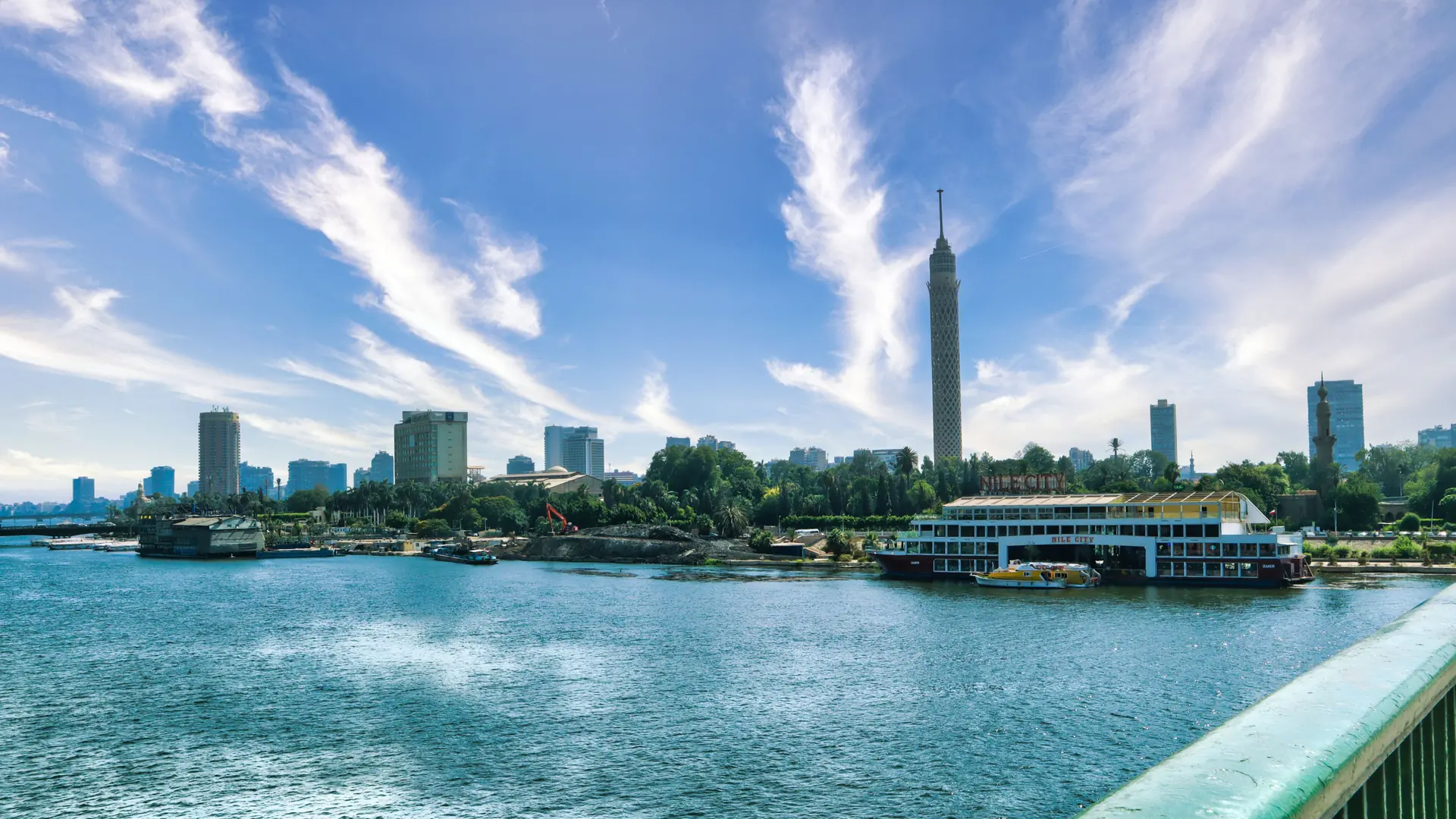 Cairo Tower on Gezira island above the bright Nile waterfront