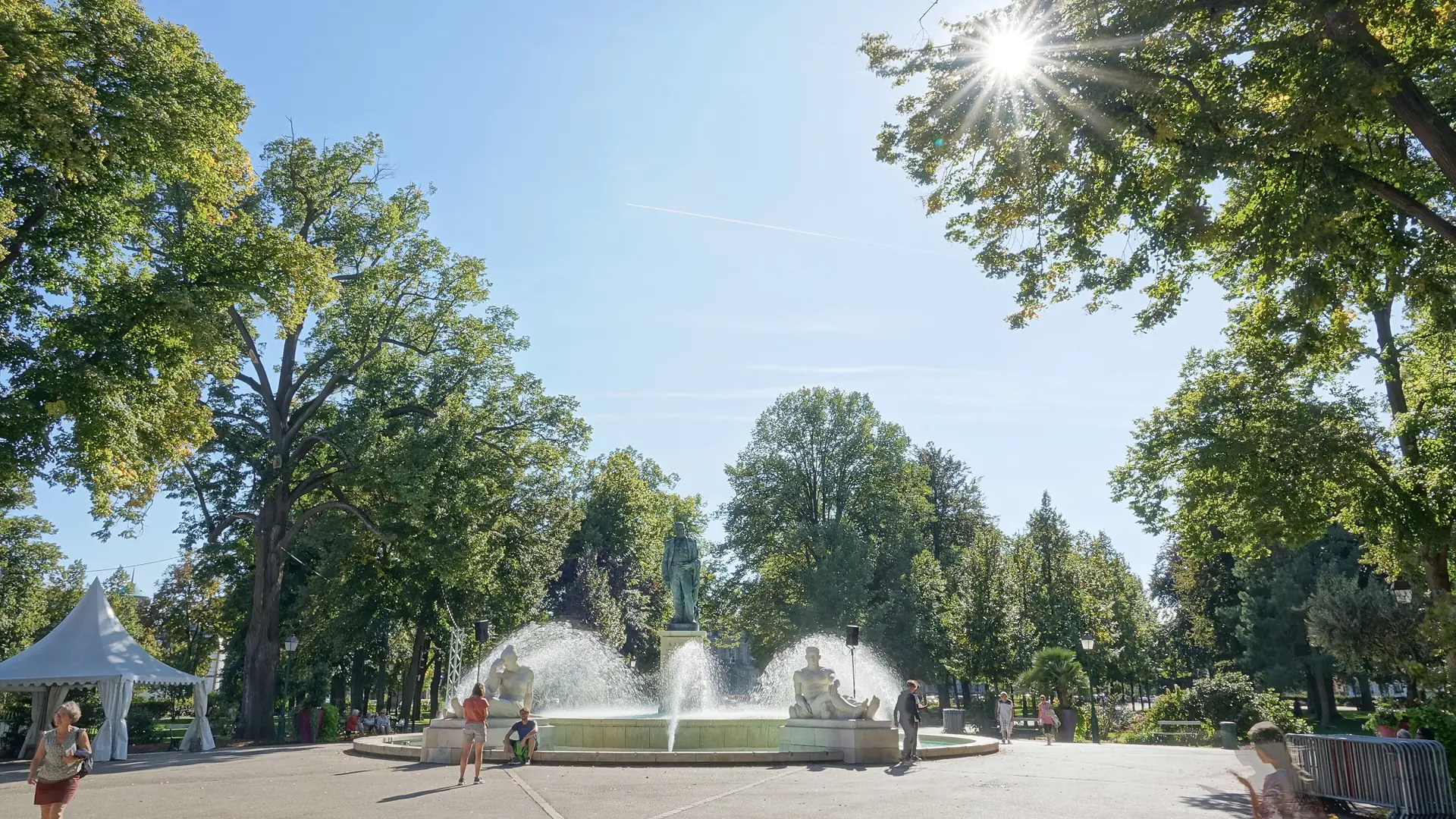 The Bruat fountain and trees in the Champ de Mars park in Colmar