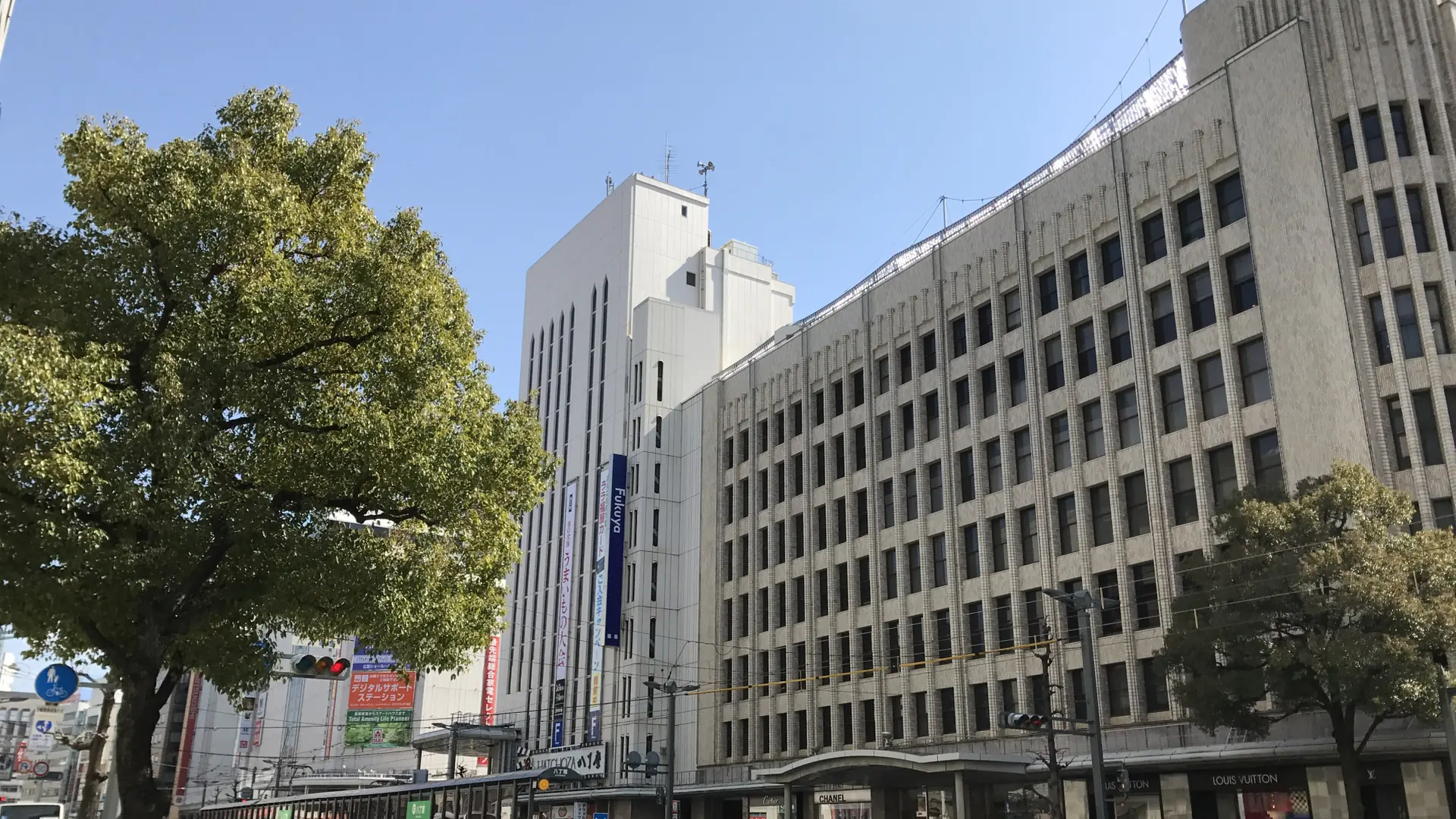 Fukuya department store and a sunlit Aioi-dori street in Hiroshima’s Hatchobori district